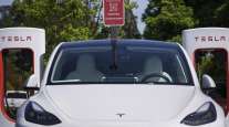 Tesla Model 3 at a Supercharge Station