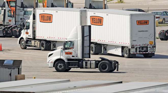 Yellow trucks at a terminal